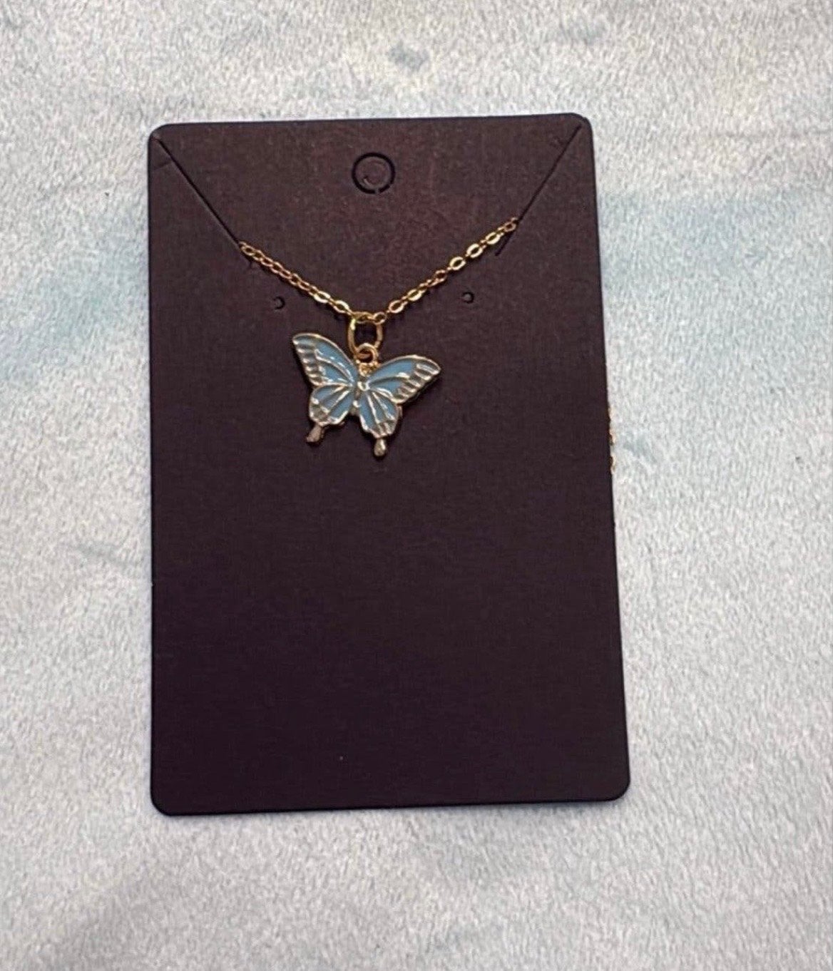 Goudkleurige ketting met vlinder hanger - Nieuw, Verzenden, Nieuw, Goud, Overige materialen