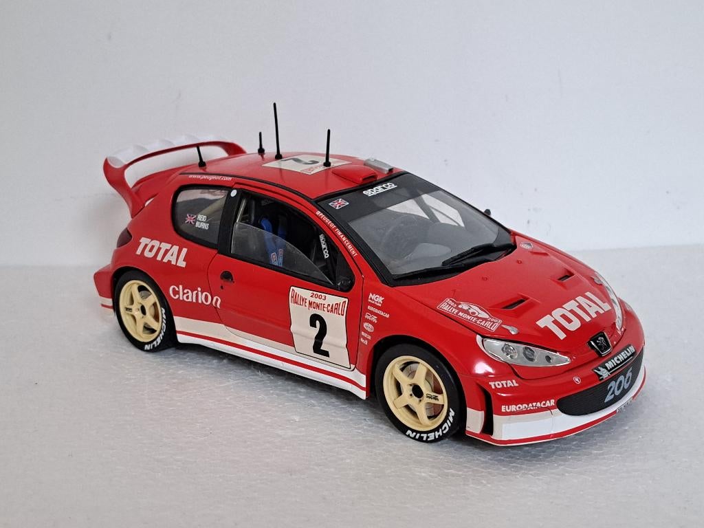 Peugeot 206 WRC Rally Monte Carlo 2003 R Burns 1/18 Solido, Hobby en Vrije tijd, Modelauto's | 1:18, Ophalen of Verzenden, Gebruikt