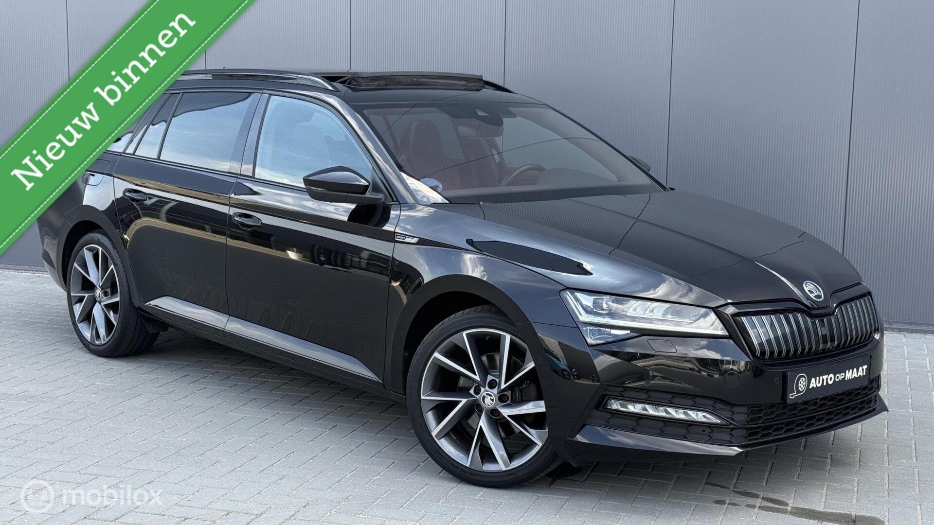 Skoda Superb Combi 1.4 TSI iV Sportline Pano Trekhaak, Auto's, Zwart, 4 cilinders, Alcantara, Zwart