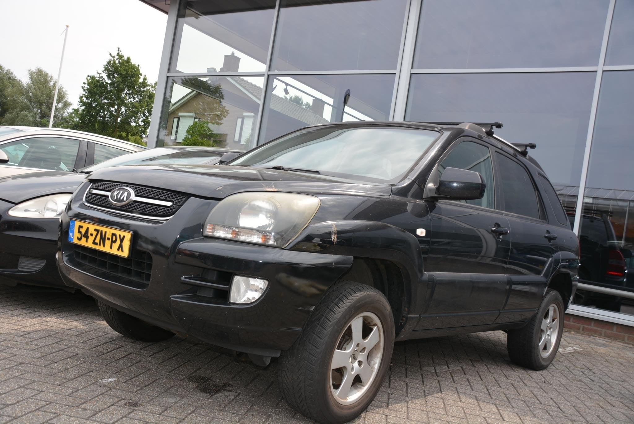 Kia Sportage 2.0 CRDi Comfort Motor defect!, Voorwielaandrijving, Stof, Gebruikt, Zwart