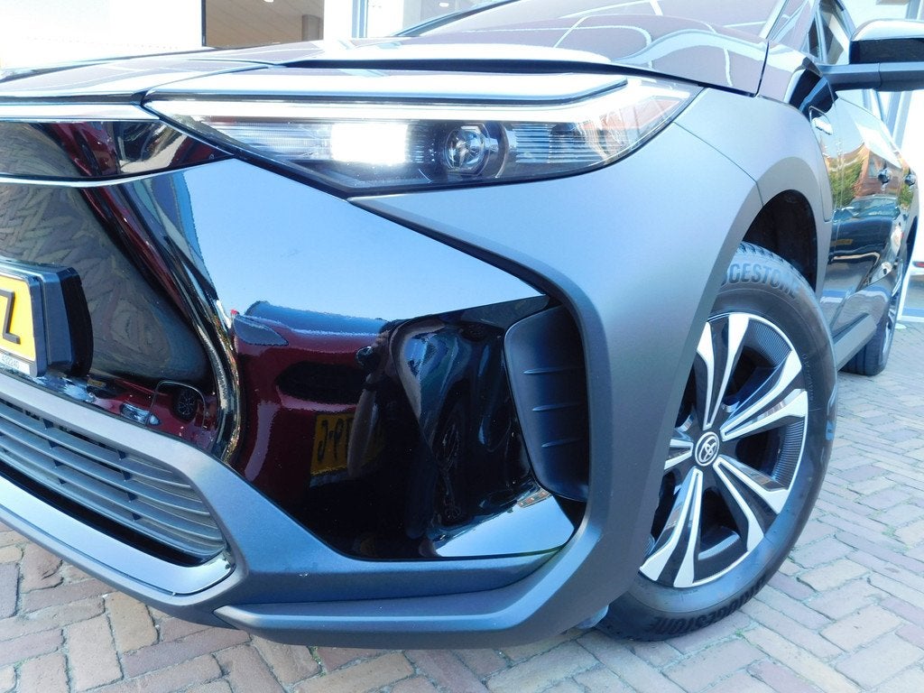 Toyota Bz4x Active 71 kWh 3-Fase | Trekhaak (bj 2023), Auto's, Toyota, 12 maanden, Stof, Gebruikt, 750 kg