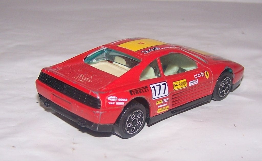 Bburago Ferrari 248 TB Evoluzione. 1/43. Izgs., Ophalen of Verzenden, Zo goed als nieuw, Auto, Overige merken