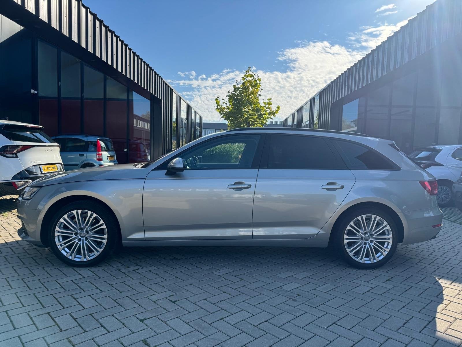 Audi A4 Avant 1.4 TFSI S-Tronic Clima Trekhaak Navi, Auto's, Stof, Gebruikt, 4 cilinders, 150 pk