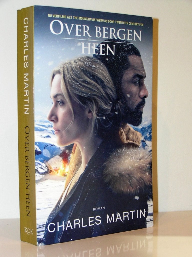 Charles Martin - Over de bergen heen (christelijk, herdruk), Boeken, Romans, Ophalen of Verzenden, Zo goed als nieuw