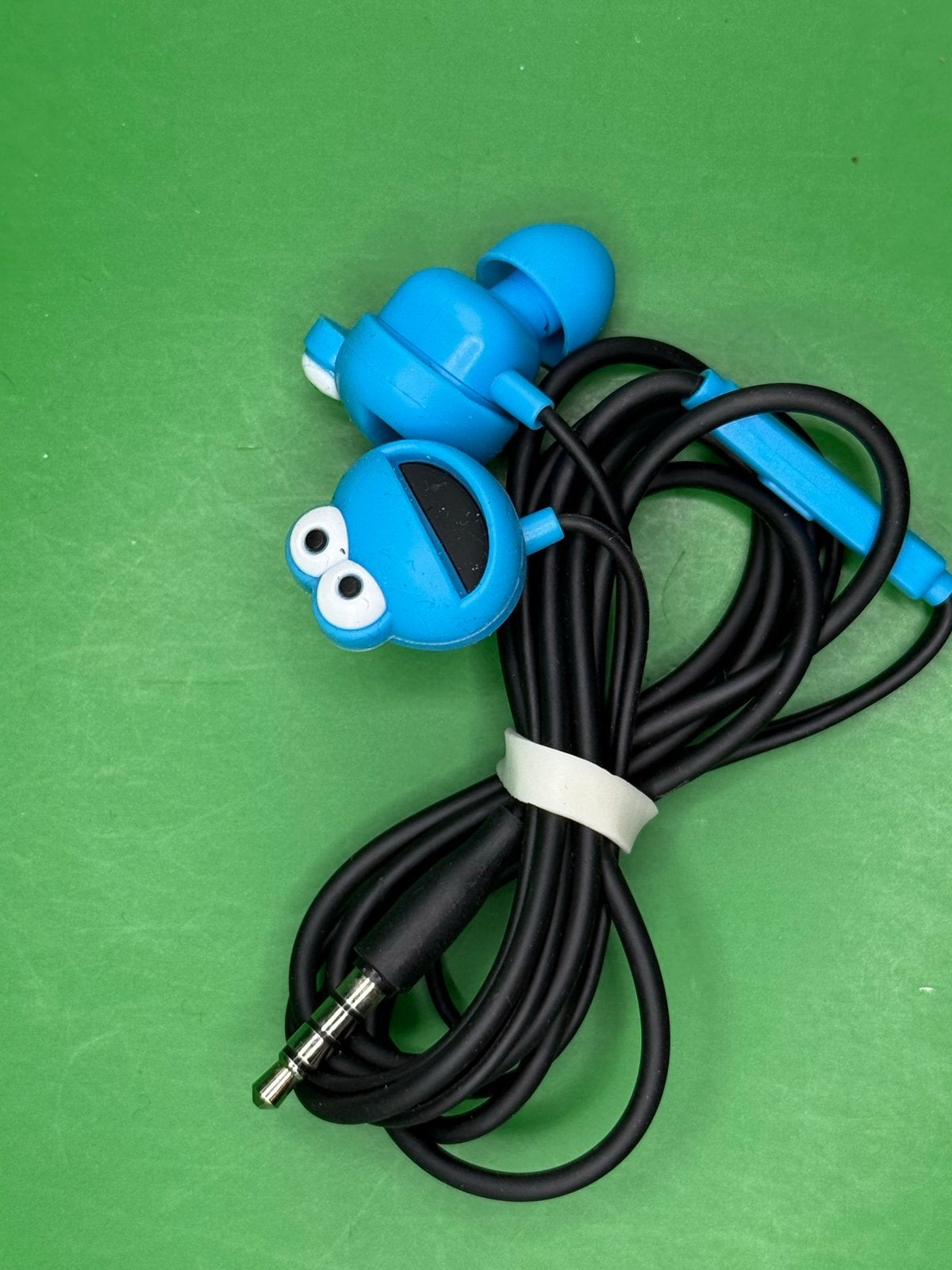 Nieuwe In-ear Hoofdtelefoon -  sesamstraat cookie monster, Overige merken, In-ear, Nieuw, Ophalen of Verzenden