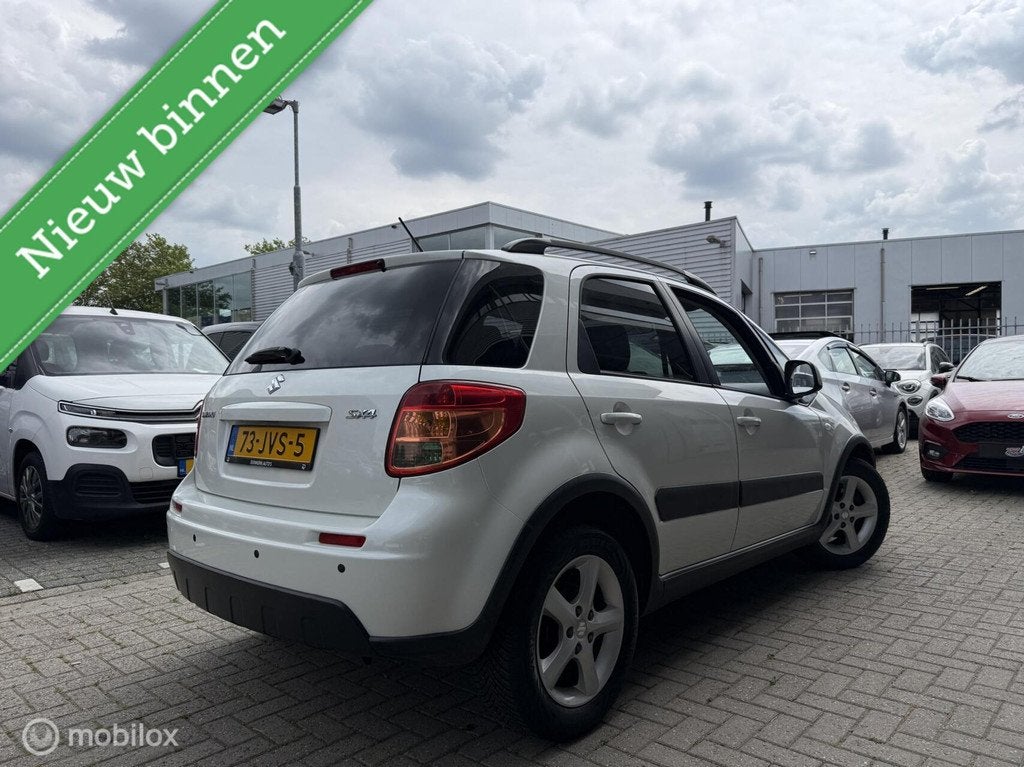 Suzuki SX4 1.6 Exclusive Parelmoer wit 1 jaar APK, Auto's, Suzuki, 15 km/l, Gebruikt, 4 cilinders, Automatische klimaatregeling