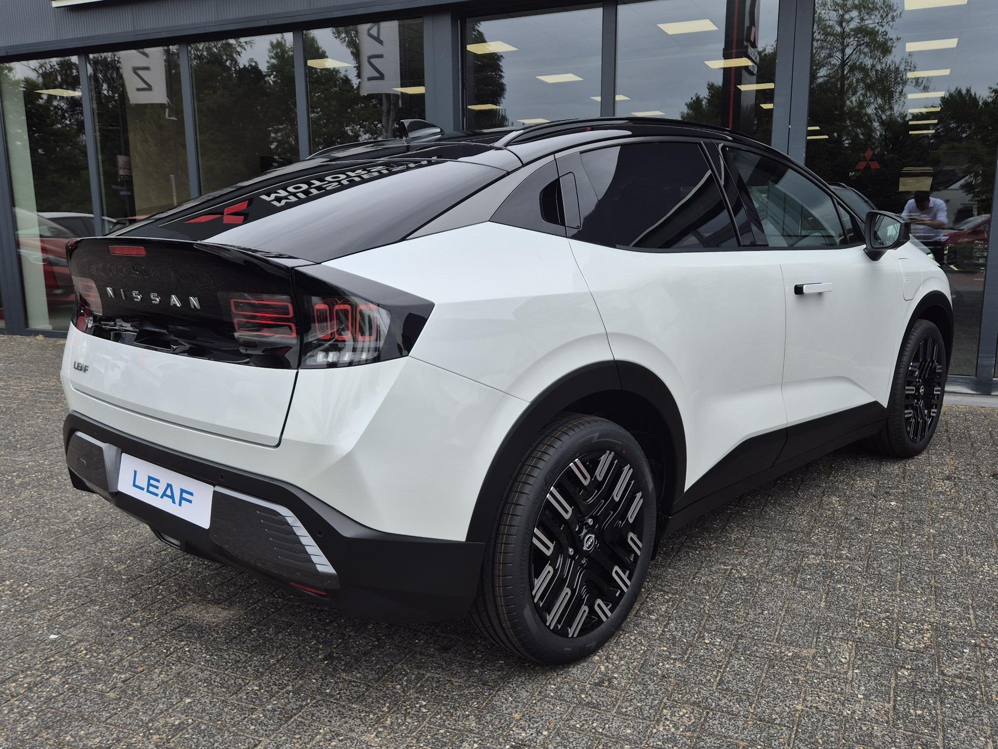 Nissan LEAF Evolve 75 kWh | Bose | Leder | Panoramadak | Act, Huisgarantie, Met garantie (alle), Wit, 75 kWh