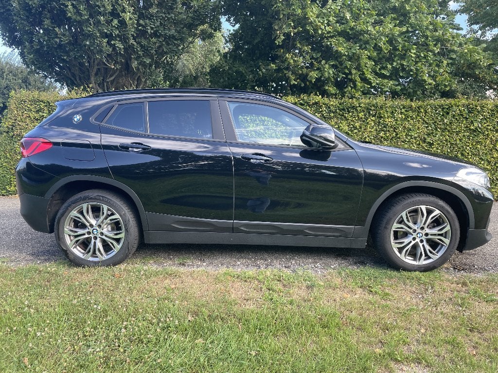 BMW X2 Sdrive18i 140pk Aut 2018 Zwart, Auto's, 4 cilinders, Zwart, Origineel Nederlands, 75 €/maand