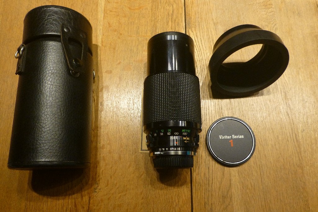 Vivitar series1 70-210 mm f3.5  mét zonnekap én lederen etui, Audio, Tv en Foto, Verzenden, Zo goed als nieuw, Spiegelreflex, Nikon