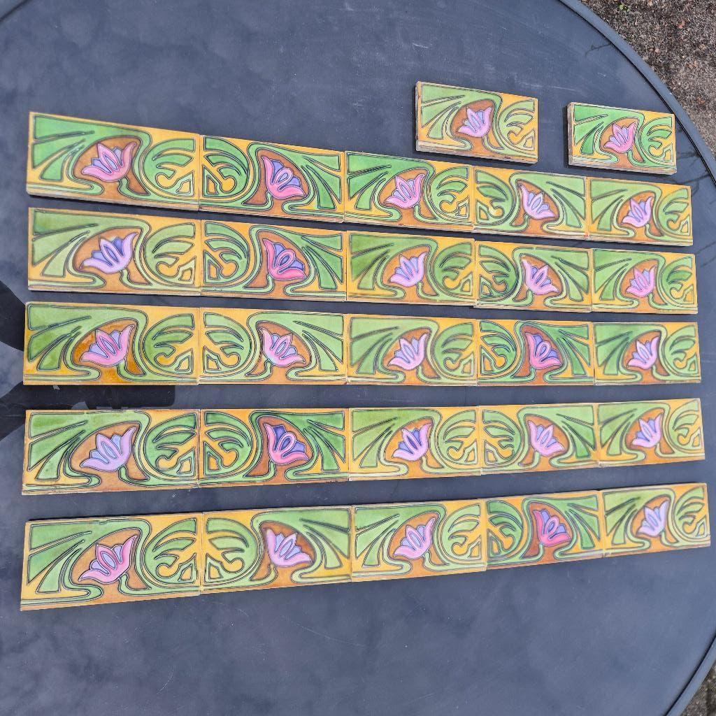 27 antieke randtegels met decor in relief, Antiek en Kunst, Ophalen