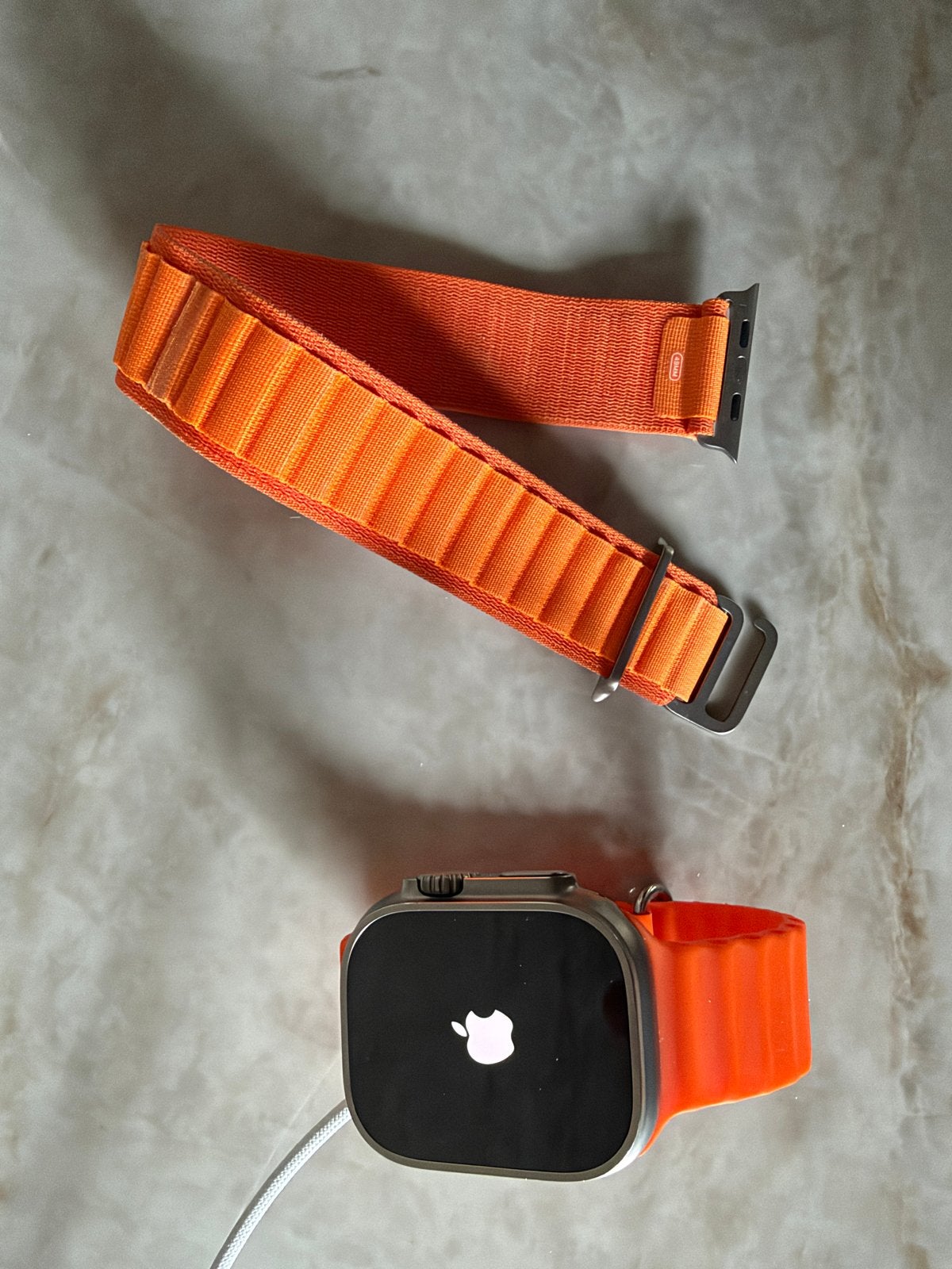 Apple Watch Ultra 49mm Titanium - Zo goed als nieuw, Afstand, IOS, Oranje, Ophalen of Verzenden