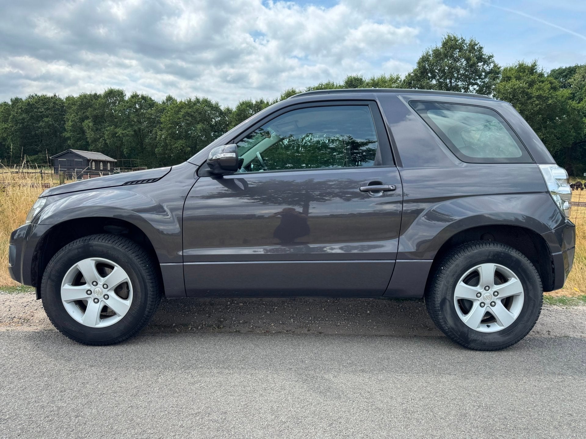 Suzuki Grand Vitara 1.6 Exclusive dealer onderhouden|climate, Auto's, Suzuki, Keurmerk '100% Onderhouden', Stof, Gebruikt, 4 cilinders
