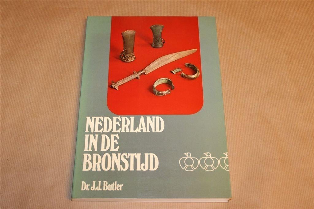 Nederland in de Bronstijd — J.J. Butler — Archeologie, Boeken, Ophalen of Verzenden, Gelezen