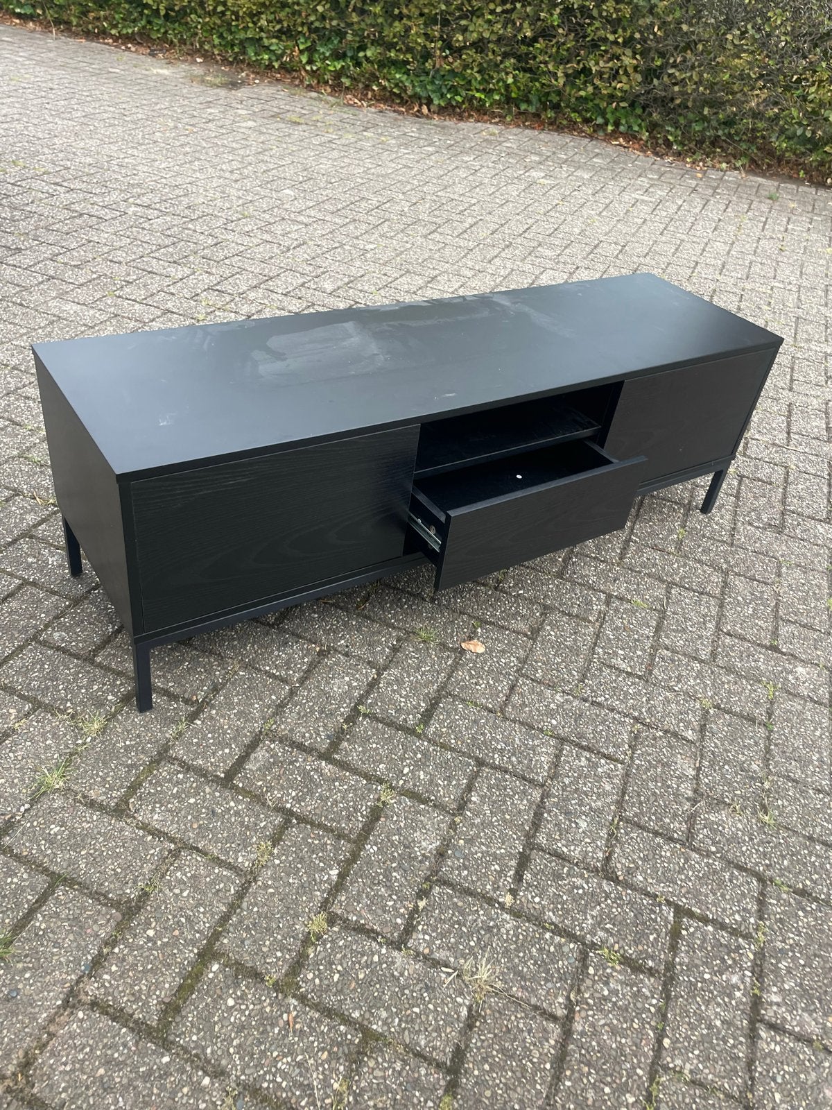 Zwarte TV kast met lichte krasjes - Gebruikt, Ophalen, Gebruikt, 100 tot 150 cm, Minder dan 100 cm
