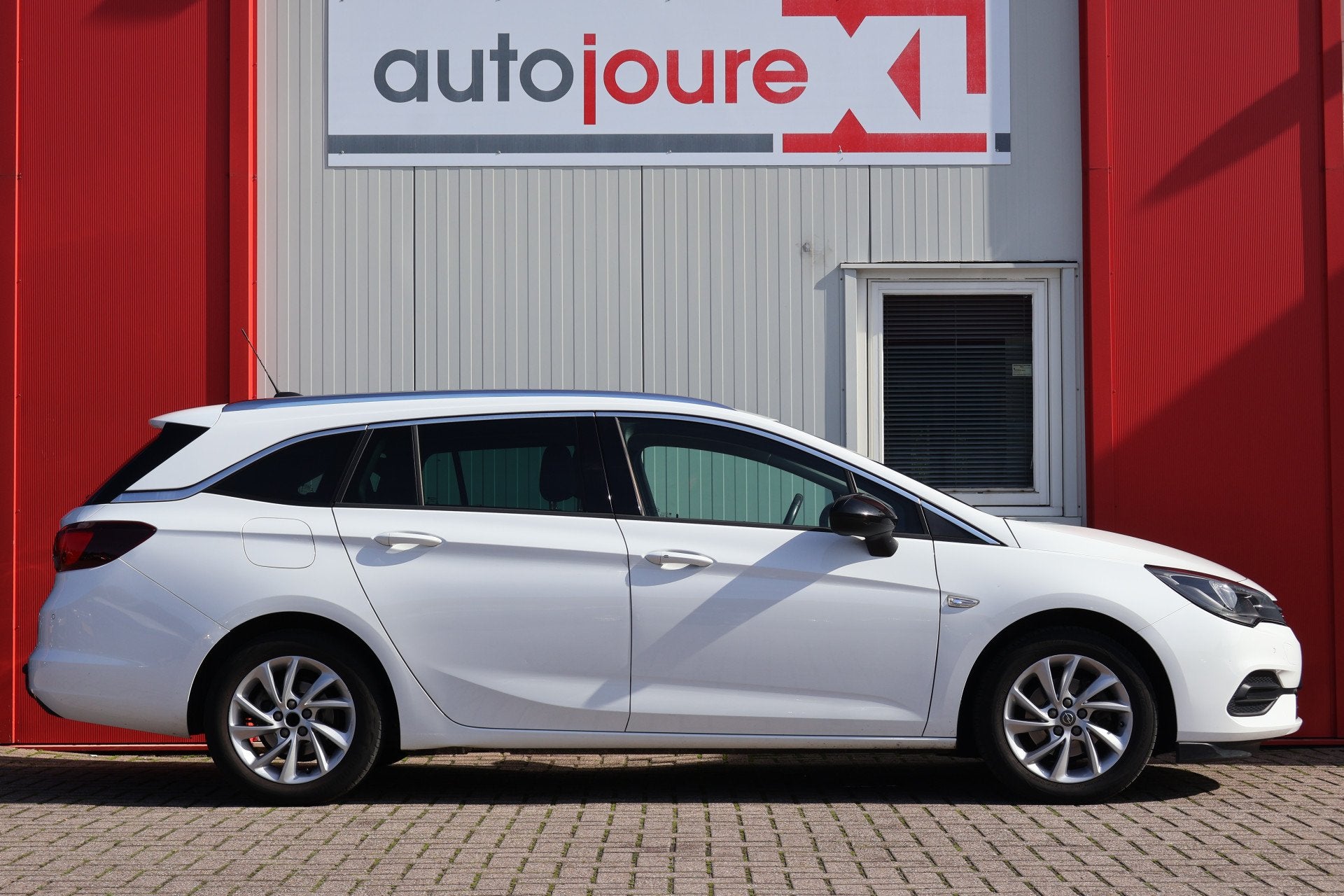 Opel Astra Sports Tourer 1.5 CDTI Business Elegance, Auto's, Voorwielaandrijving, Gebruikt, Wit, Origineel Nederlands