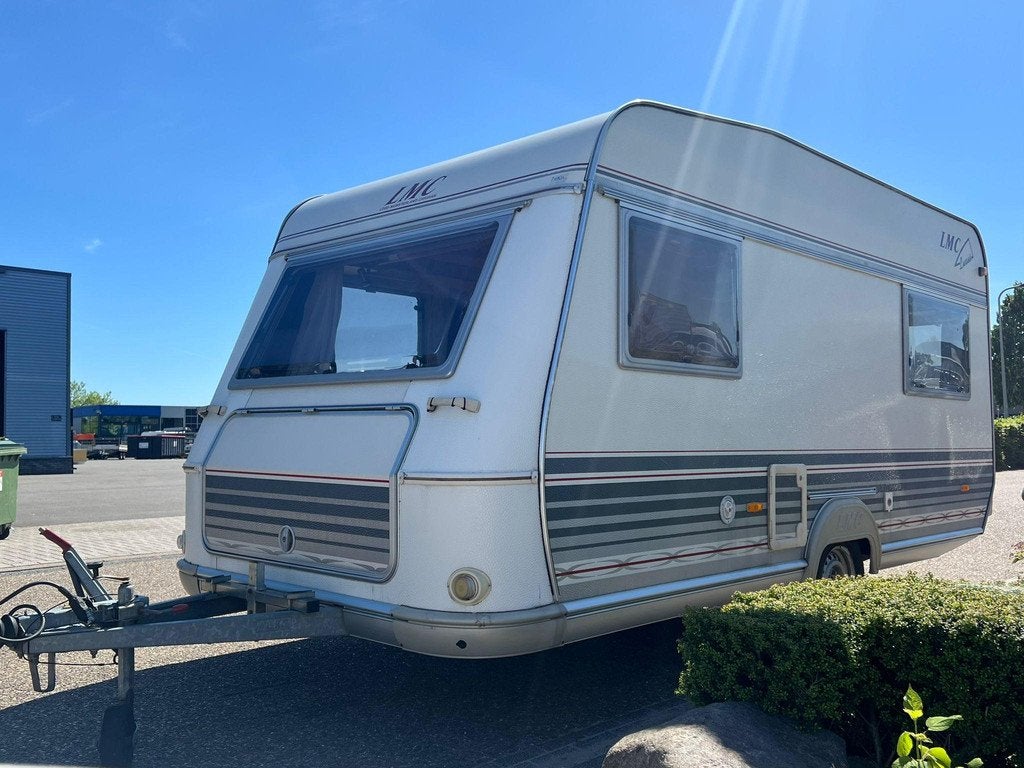 Lmc 450 | Fietsenrek | Half Automatische Mover | Dinette | V, Caravans en Kamperen, Vast bed, Bedrijf, 750 - 1000 kg, 6 tot 7 meter