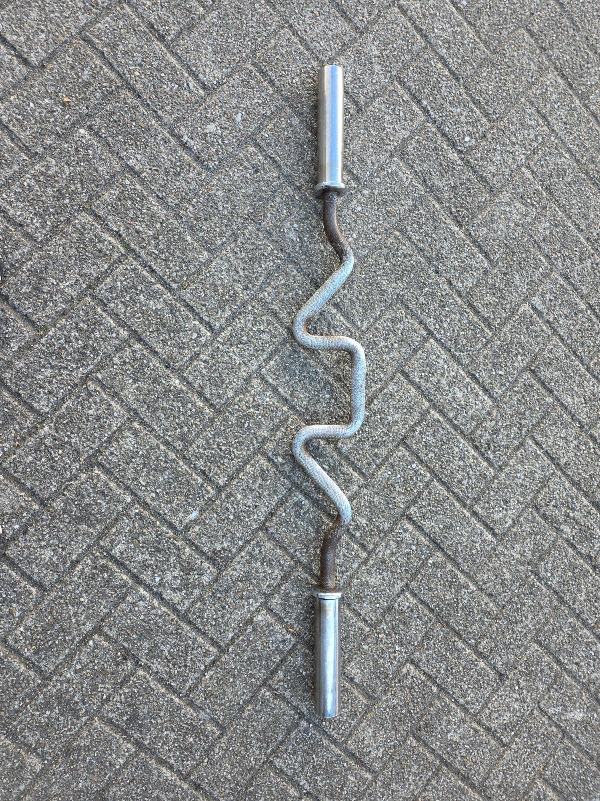 Olympic Super EZ Curl Bar 120 cm met clips, Sport en Fitness, Fitnessmaterialen, Ophalen, Gebruikt, Armen, Halterstangen
