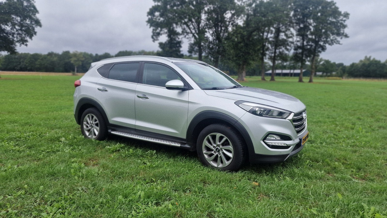 Hyundai Tucson 1.6 GDi 132pk 2016 Grijs, Auto's, Voorwielaandrijving, 1591 cc, 4 cilinders, 132 pk