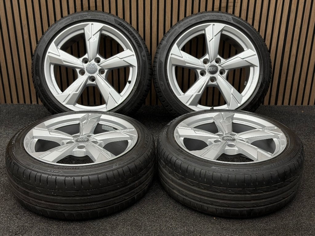Originele 18 inch Audi A4 B9 5x112 ET39 66.5 Bridgestone, Ophalen, 18 inch, ., Banden en Velgen