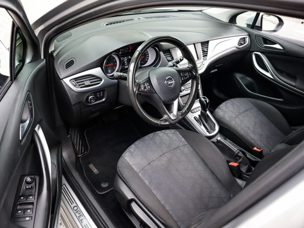 Opel Astra Sports Tourer 1.4 Turbo 120 Jaar Edition Keurig-O, Auto's, 12 maanden, Stof, Gebruikt, Origineel Nederlands
