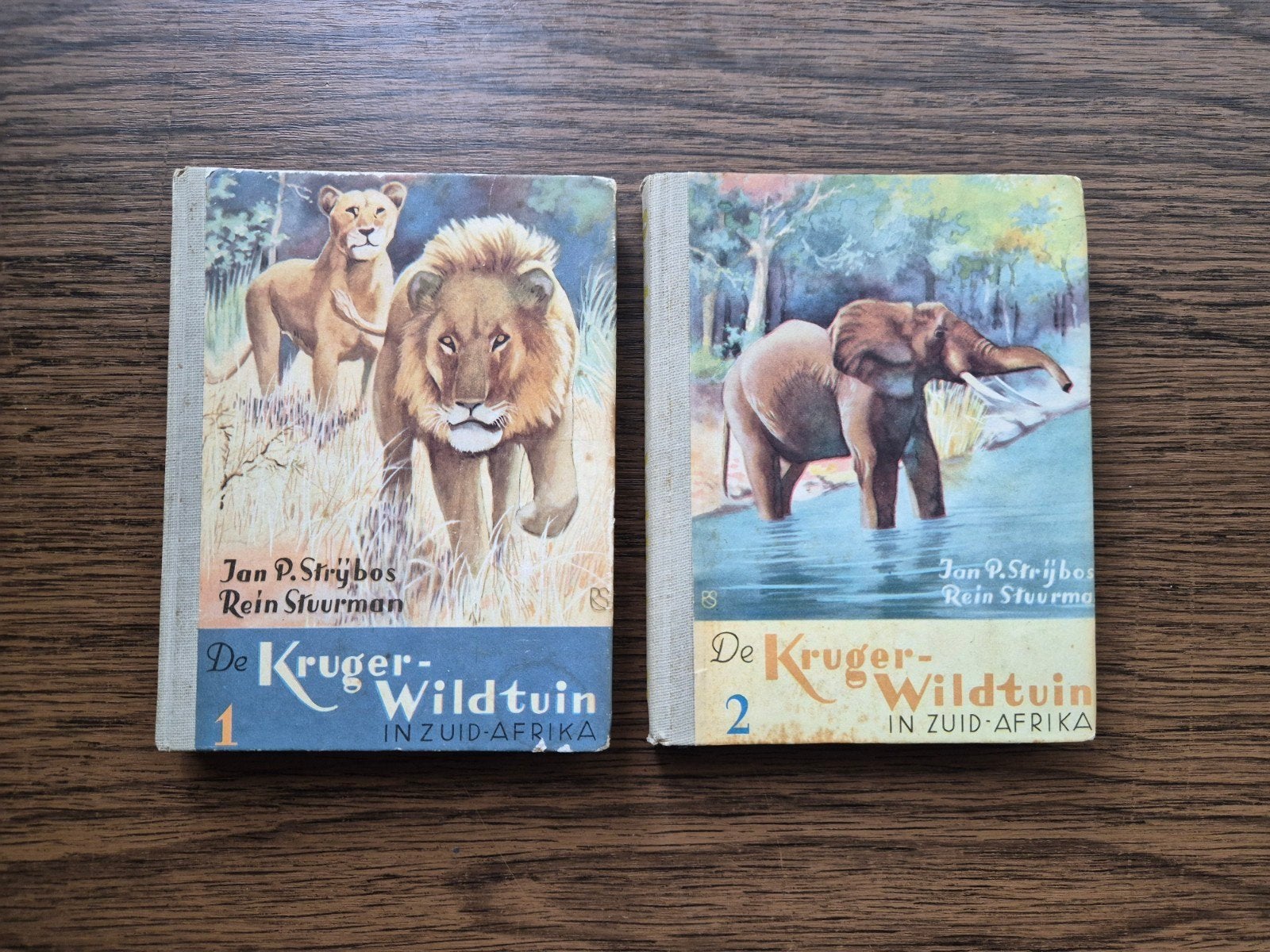 Complete set: De Kruger-Wildtuin in Zuid-Afrika Deel 1 & 2, Boeken, Prentenboeken en Plaatjesalbums, Ophalen of Verzenden, Gelezen