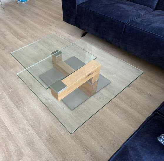 Glazen salontafel met draaibare poot - Uniek design, Ophalen, Gebruikt, 100 tot 150 cm, 50 tot 100 cm