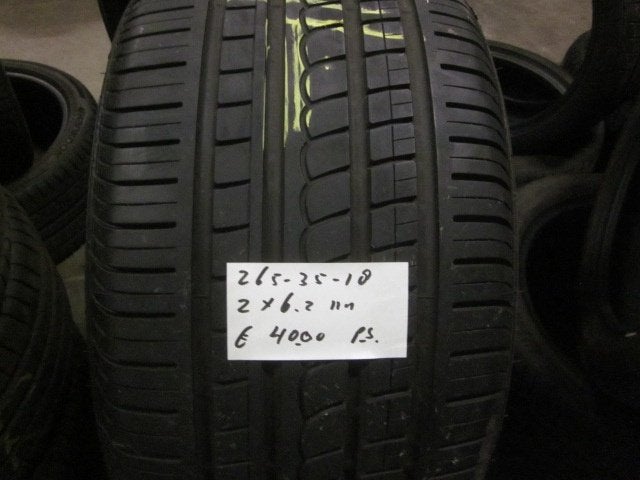 265 35 18 Pirelli P Zero Rosso zomerbanden, 18 inch, Gebruikt, 265 mm, Ophalen of Verzenden