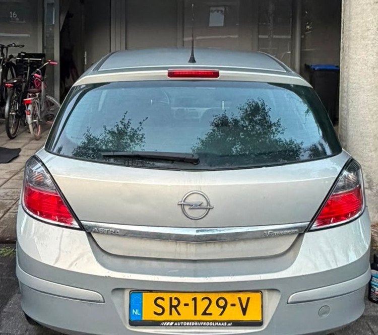 Opel Astra 1.6 16V 77KW 5D AUT 2007 Grijs, Adaptieve lichten, 4 cilinders, 635 kg, 1200 kg