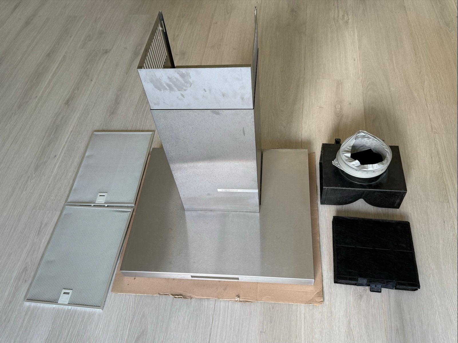 Bosch DWB67CM50 Afzuigkap met Recirculatie Set, Ophalen, Gebruikt, Wandschouwkap, 400 tot 600 m³ per uur