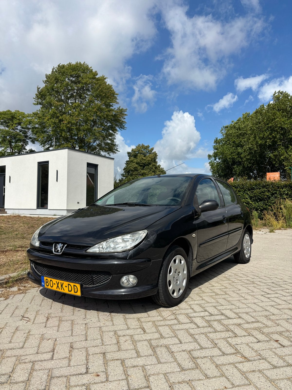Peugeot 206 1.4 5D 2007 Zwart Nieuwe Einddemper, Auto's, Peugeot, Voorwielaandrijving, 31 €/maand, 4 cilinders, Zwart