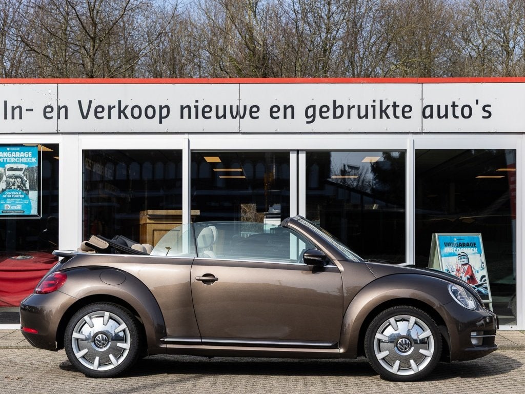 Volkswagen Beetle Cabriolet 1.2 TSI Design BlueMotion, Auto's, Volkswagen, Voorwielaandrijving, Euro 5, Stof, Gebruikt
