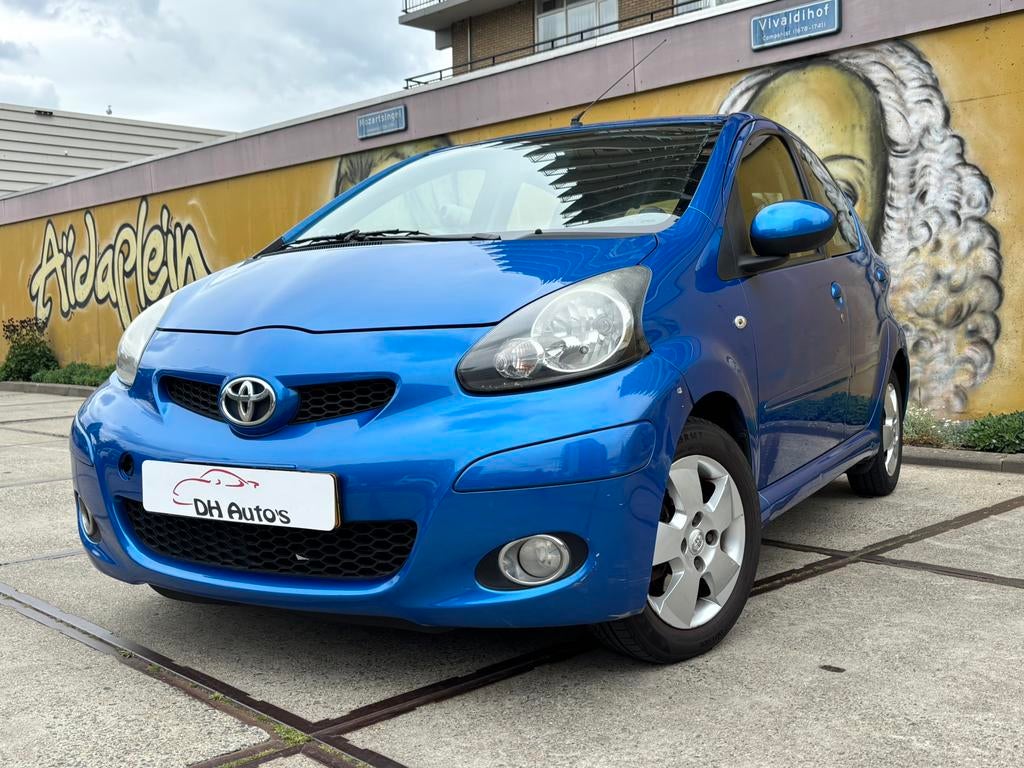 Toyota Aygo 1.0 | 5 Deur | Airco | Dynamic | LM Velgen | APK, Auto's, Voorwielaandrijving, Stof, Zwart, Origineel Nederlands