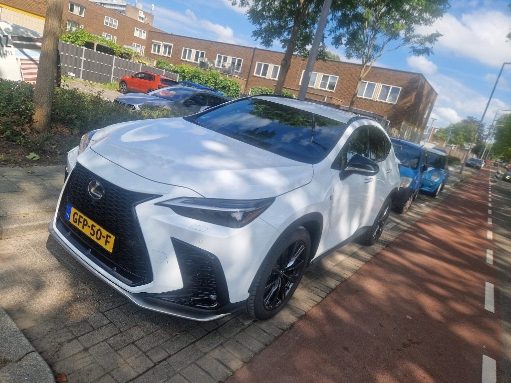 Lexus NX 450h sport+ Hybrid 306pk AWD CVT 2023 Wit, Auto's, Automaat, Zwart, 4 cilinders, 2487 cc