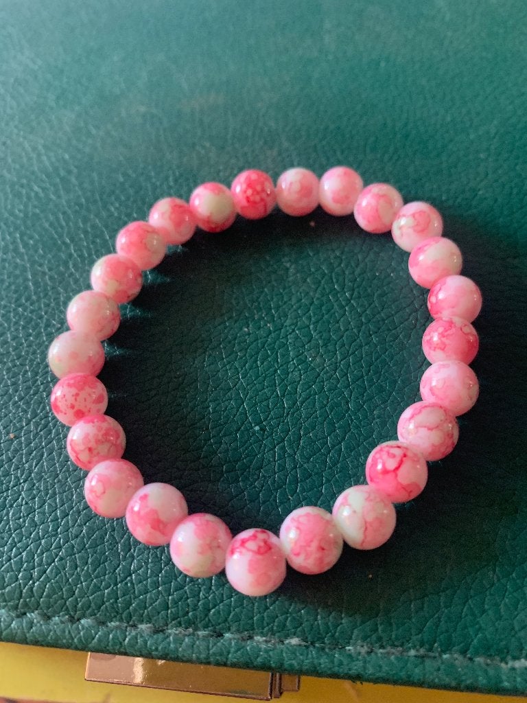 Roze kralen armbandje, Sieraden, Tassen en Uiterlijk, Armbanden, Ophalen of Verzenden, Zo goed als nieuw, Roze, Elastiek