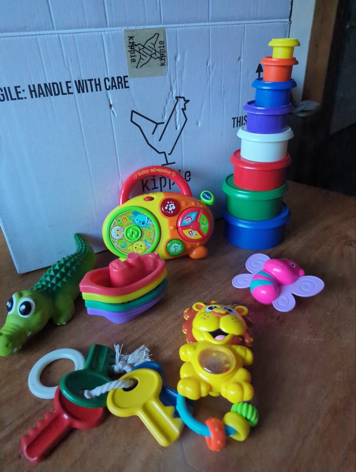 Diverse baby speelgoed: rammelaars, stapeltoren en meer, Ophalen of Verzenden, Gebruikt, Overige typen, Met geluid