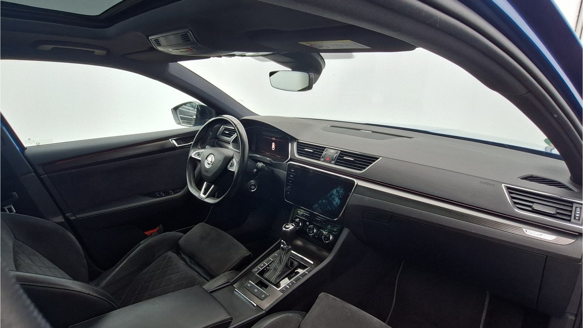 Skoda Superb Combi 1.5 TSI ACT Sportline Pano Trekhaak Canto, Auto's, Euro 6, 4 cilinders, 150 pk, Blauw