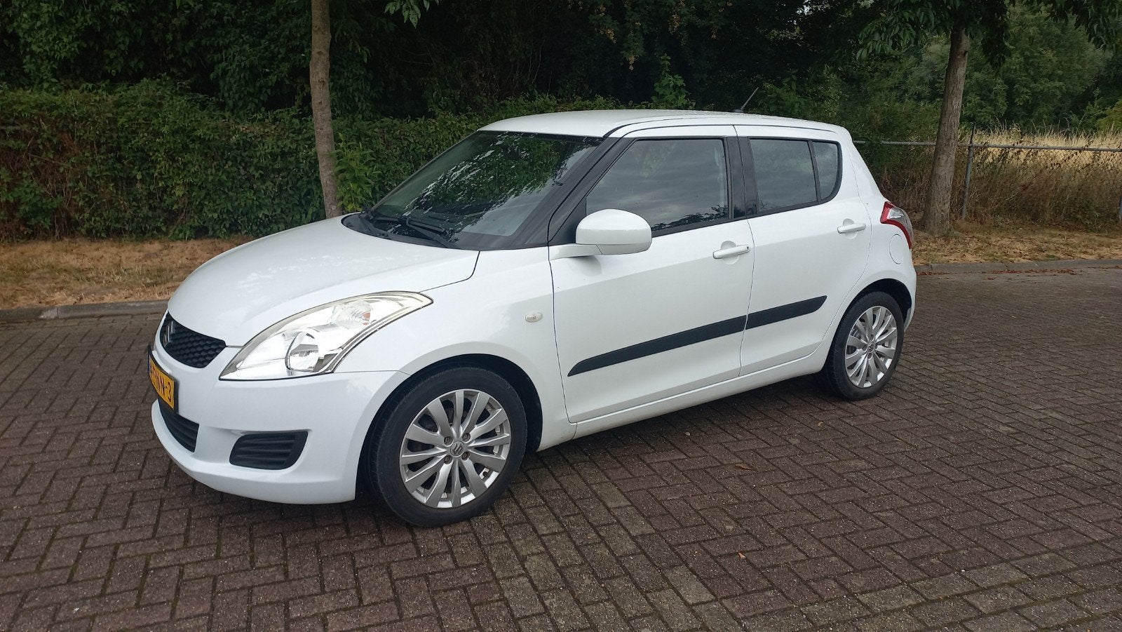 Suzuki Swift 1.2 5-D AUTOMAAT 2011 Wit, Stof, 40 €/maand, 4 cilinders, 965 kg