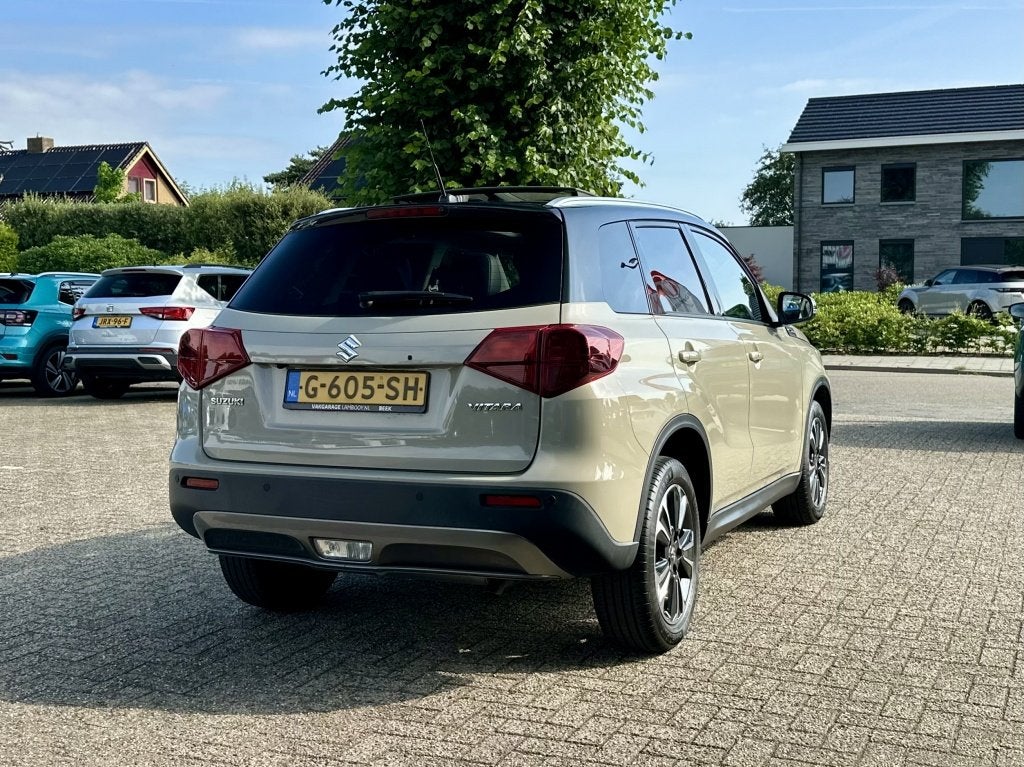 Suzuki Vitara 1.4 140PK Boosterjet Stijl Automaat Panodak NL, Auto's, Suzuki, Gebruikt, Euro 6, 4 cilinders, Bruin