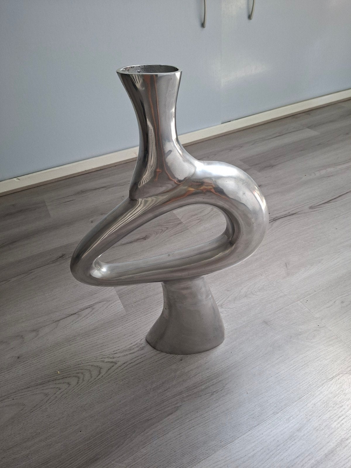 Rvs Design Vaas, Ophalen