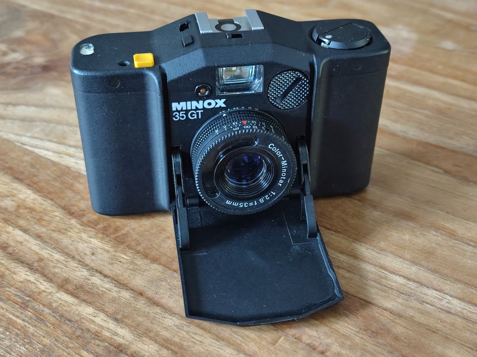 Minox 35 GT compact camera met lederen tas en handleiding, Ophalen of Verzenden, Compact, Overige Merken