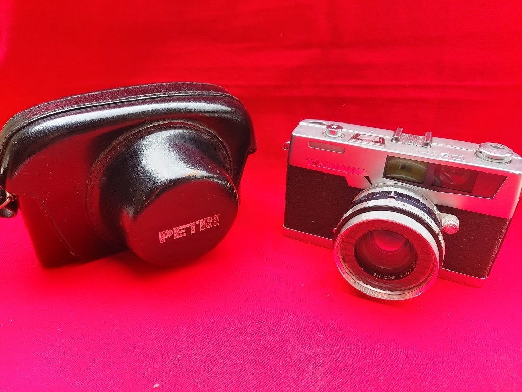 camera  mooie Petri 7s in goed werkende staat ., Audio, Tv en Foto, Fotocamera's Analoog, Ophalen of Verzenden, Gebruikt, Compact
