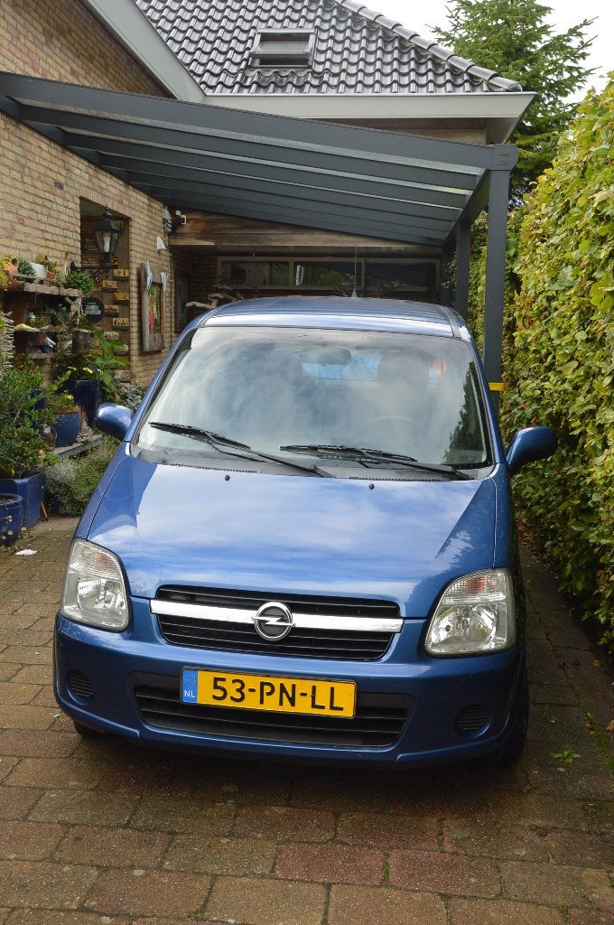 Opel Agila 1.2 I 16V 2004 Blauw km stand 104856 met trekhaak, Voorwielaandrijving, Dealer onderhouden, Stof, Zwart