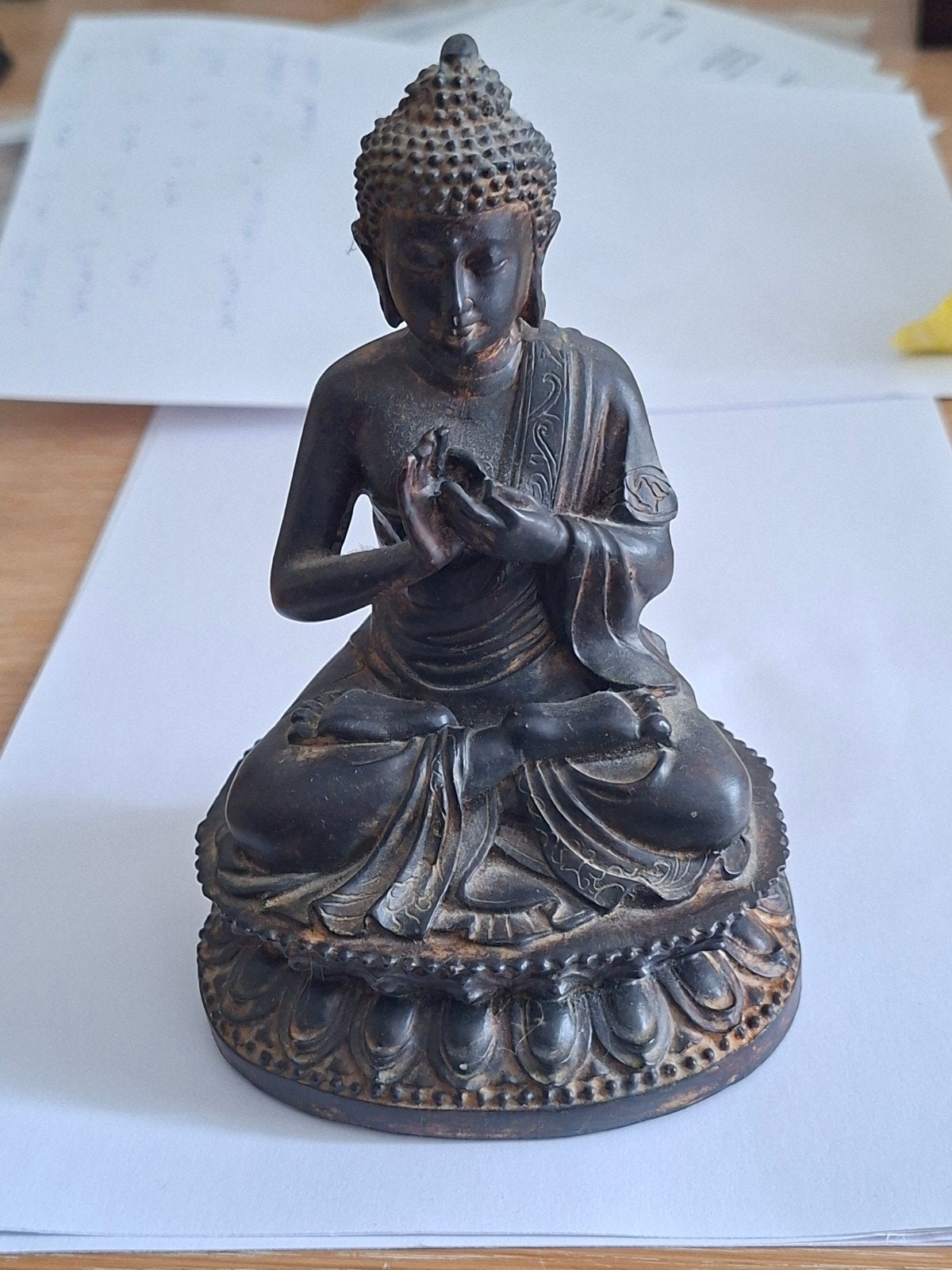 Mediterende Boeddha, Ophalen