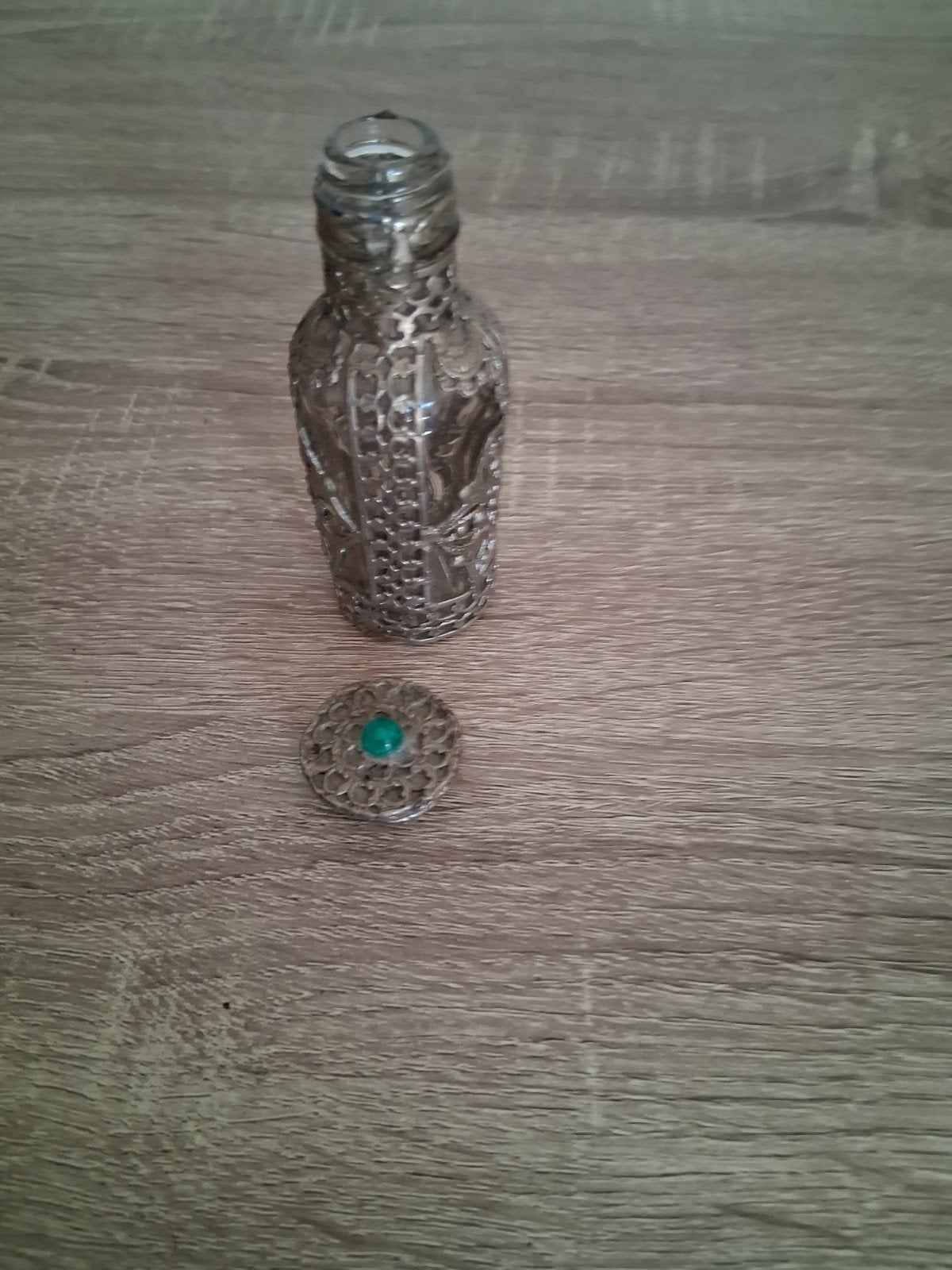 Oud parfum flesje, Ophalen