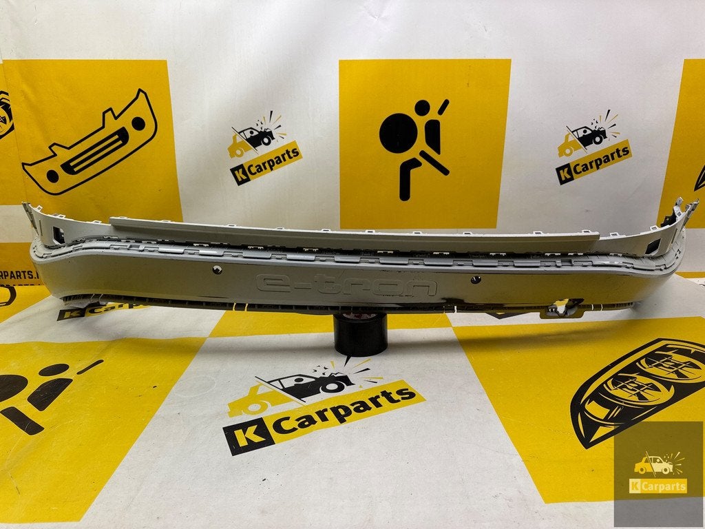 Bumperlijst achterbumper Audi E Tron 4KE PDC 4KE807833, Gebruikt, AUDI AG, Auto-Union-Strasse 1
85045  Ingolstadt, DE, Bumper