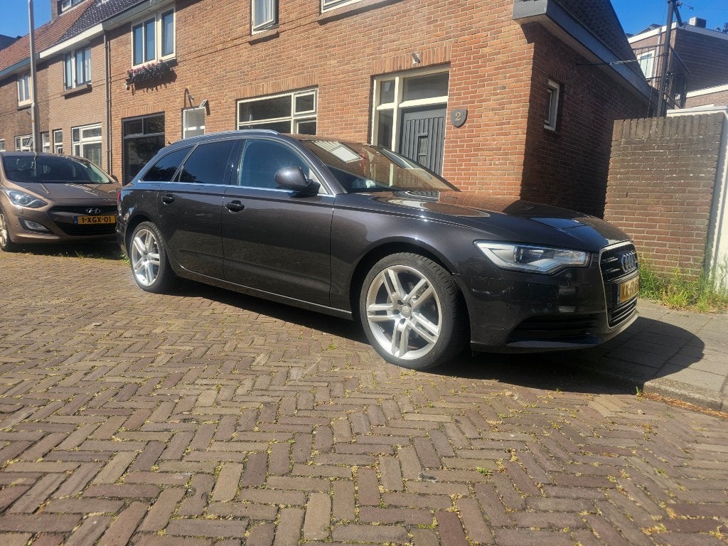 Audi A6 2.0 TDI 100KW Avant 2012 Grijs, Auto's, Audi, Voorwielaandrijving, 136 pk, 1800 kg, Zwart
