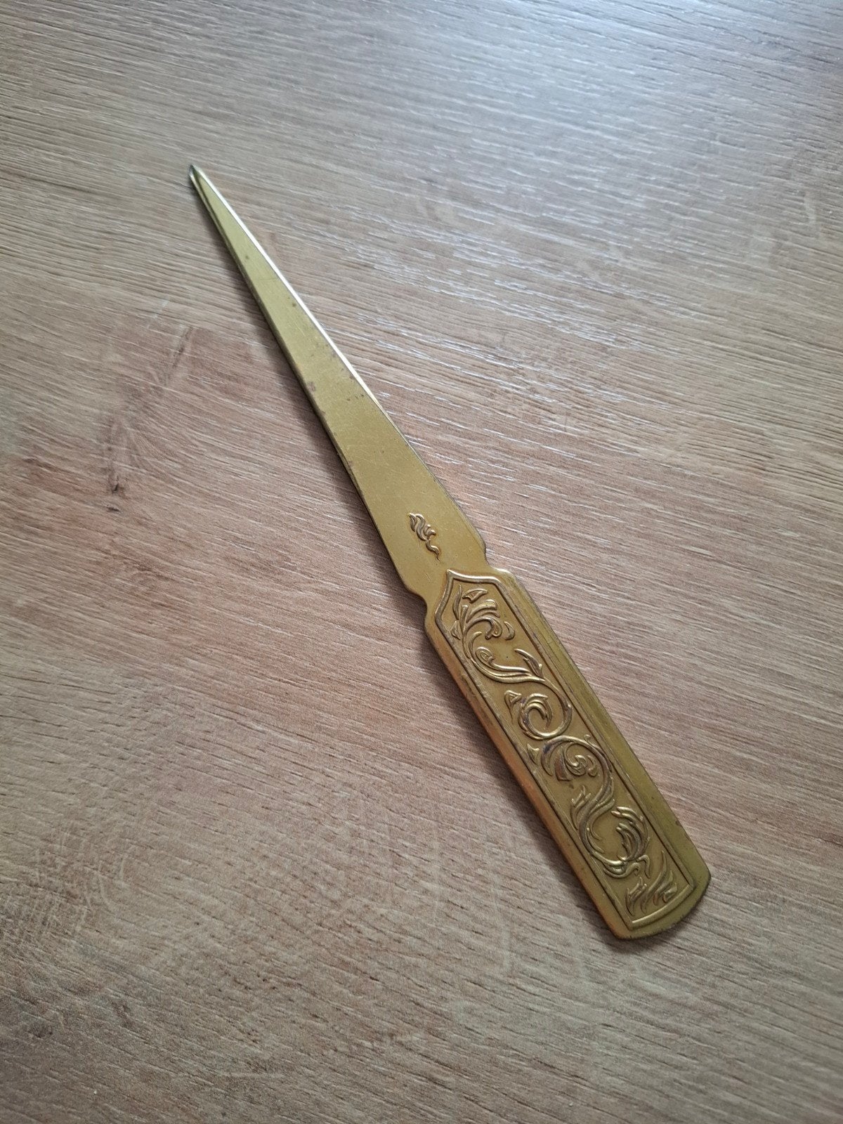Antieke briefopener, Ophalen