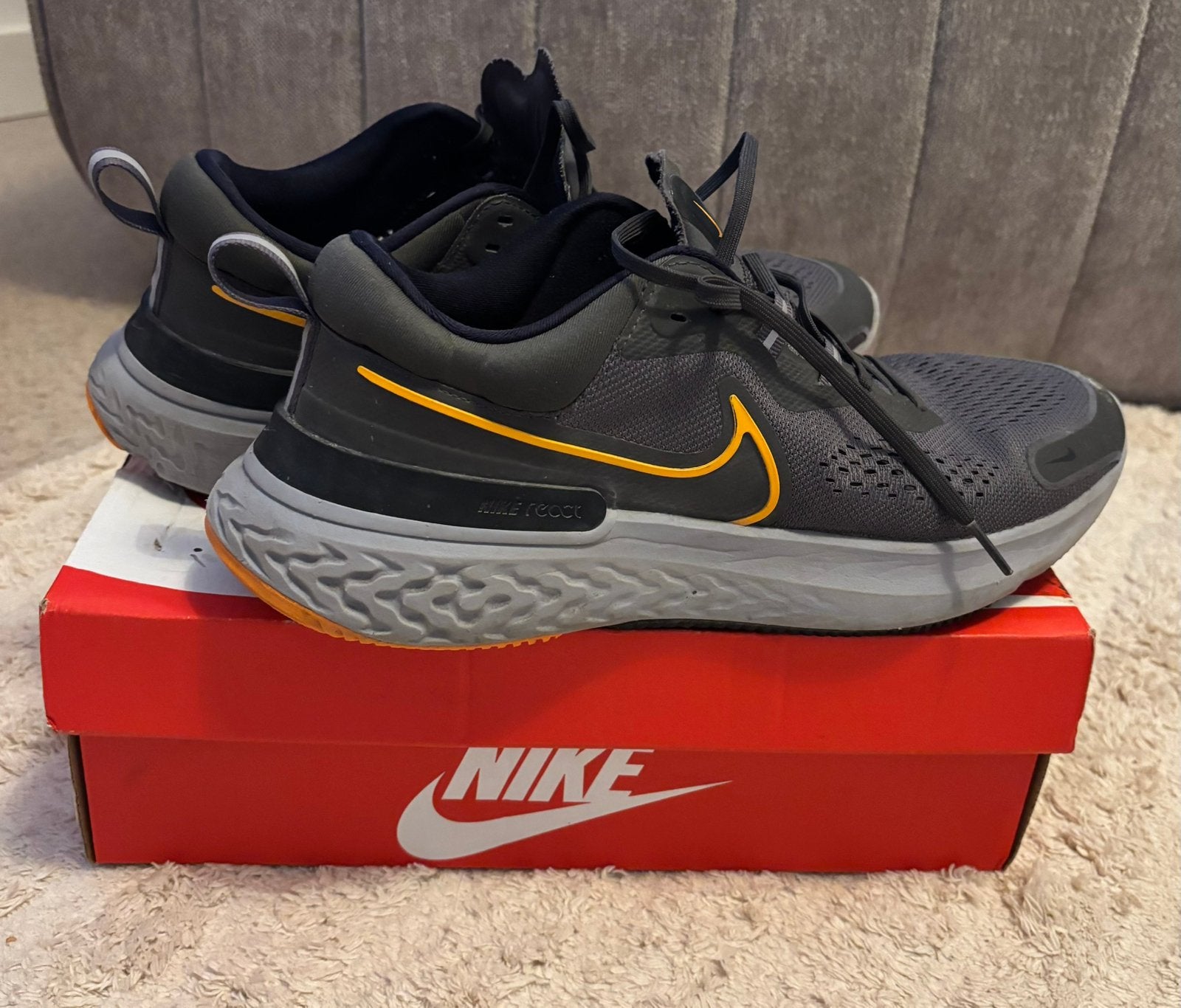 Nike React Miller 2 - Hardloopschoenen- Zwart/Oranje, Gebruikt, Nike, Ophalen of Verzenden, Spikes