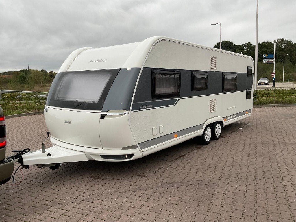 Hobby Prestige 650 KFU, Caravans en Kamperen, Rondzit, Hobby, Vast bed, 7 tot 8 meter