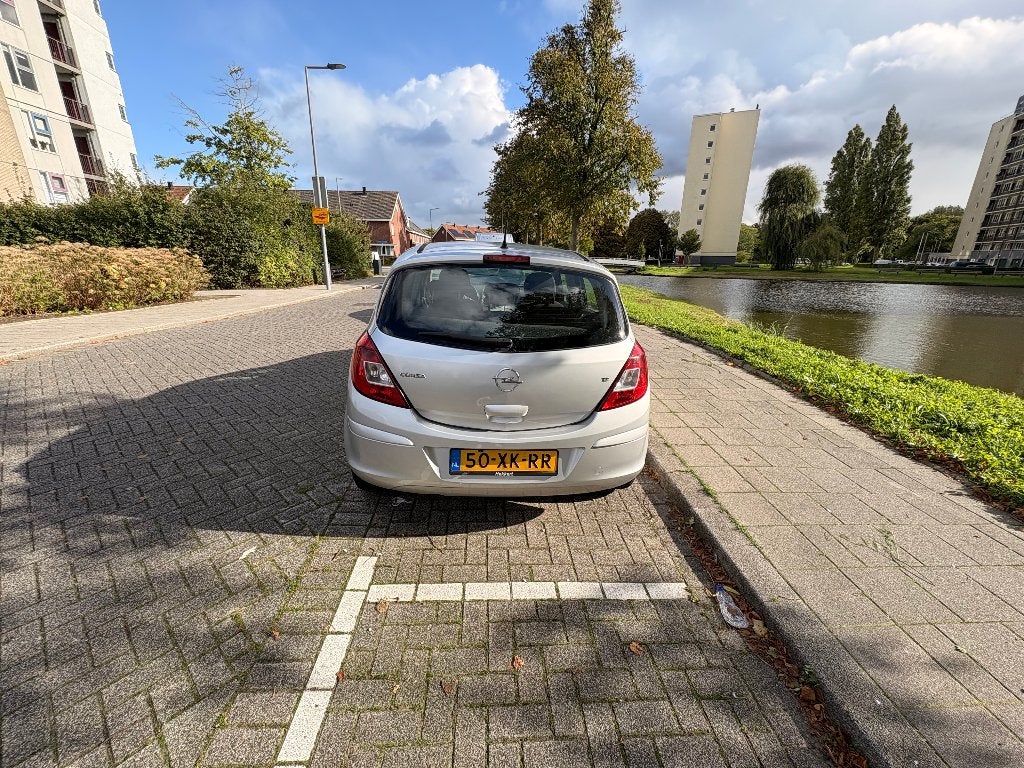 Opel Corsa 1.2 16V 5D WR 2007 Grijs, Voorwielaandrijving, Stof, Elektrische ramen, Zwart